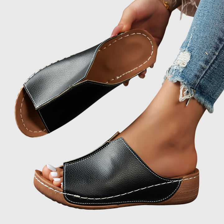 Chic women's open-toe flat sandals, perfect for casual elegant summer wear & everyday comfort. Supportive.