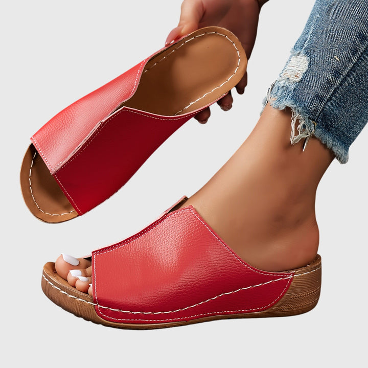 Adjustable open-toe flat sandals for women. Ergonomic design provides comfort & support for everyday wear.