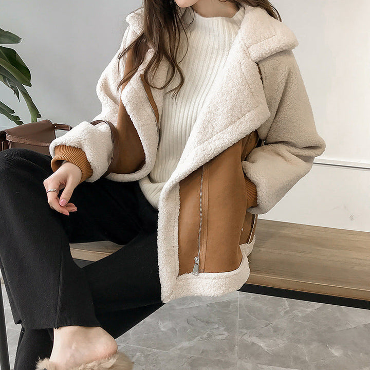Soft faux shearling women's oversized coat, perfect for winter, offering warmth and style