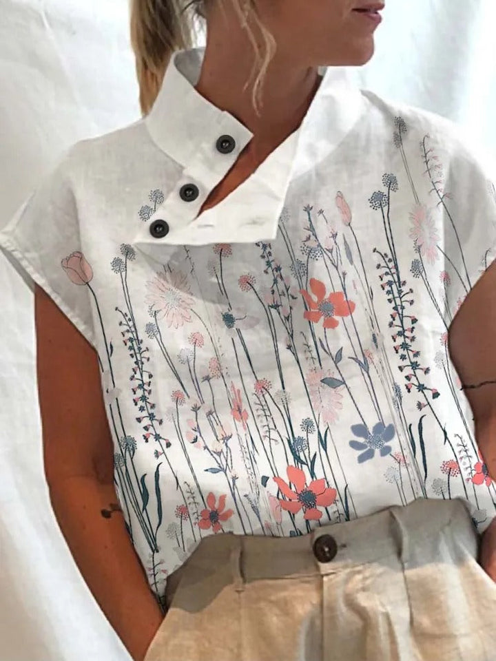 Women's Felicia short sleeve blouse with a charming playful print, perfect for summer casual wear or office.