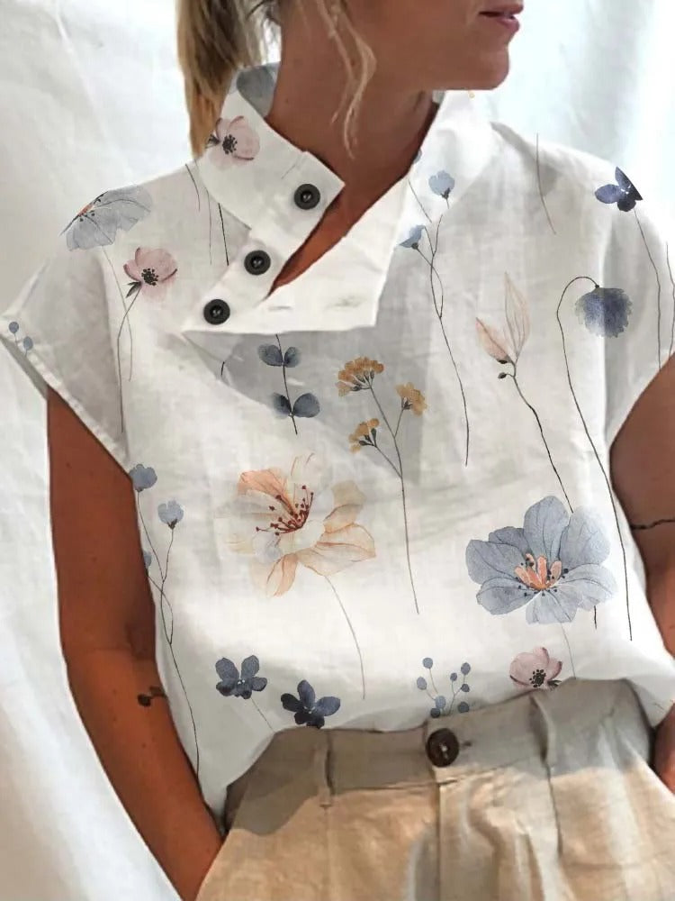 Trendy women's short sleeve floral top with delicate dragonfly print, a comfortable and versatile summer blouse.