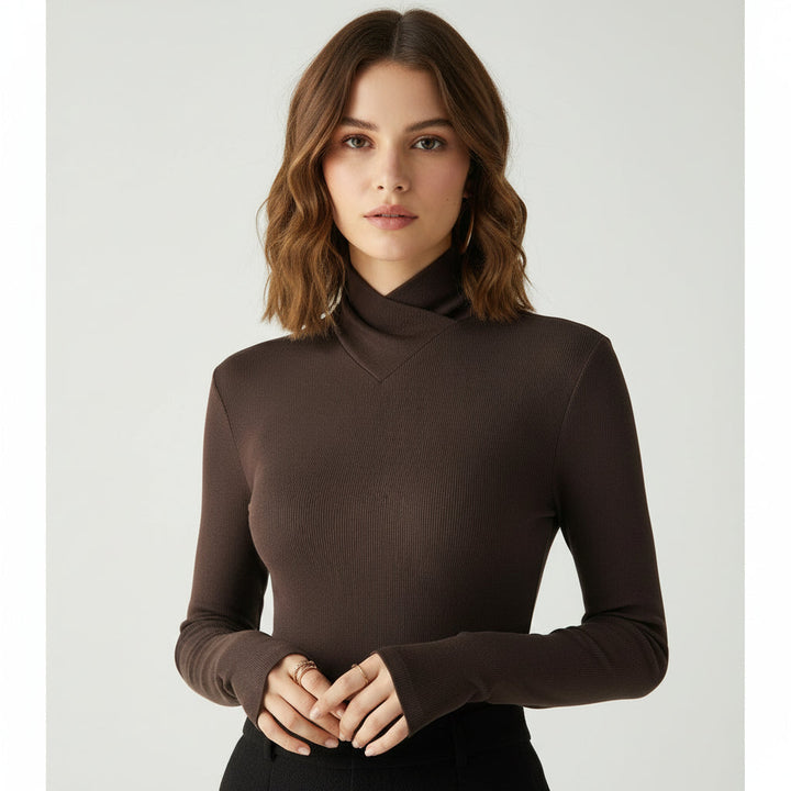 Women's fitted turtleneck sweater with long sleeves & thumb holes. Perfect for elegant fall & winter layering or cozy casual style.