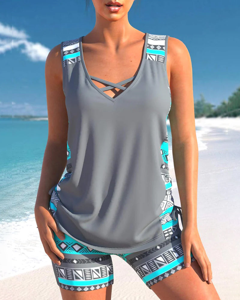Elegant women's swimsuit featuring tummy control design, perfect for a flattering beachwear style.