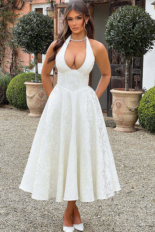 Stunning women's floral midi dress, halter neck & corset, for sophisticated events.