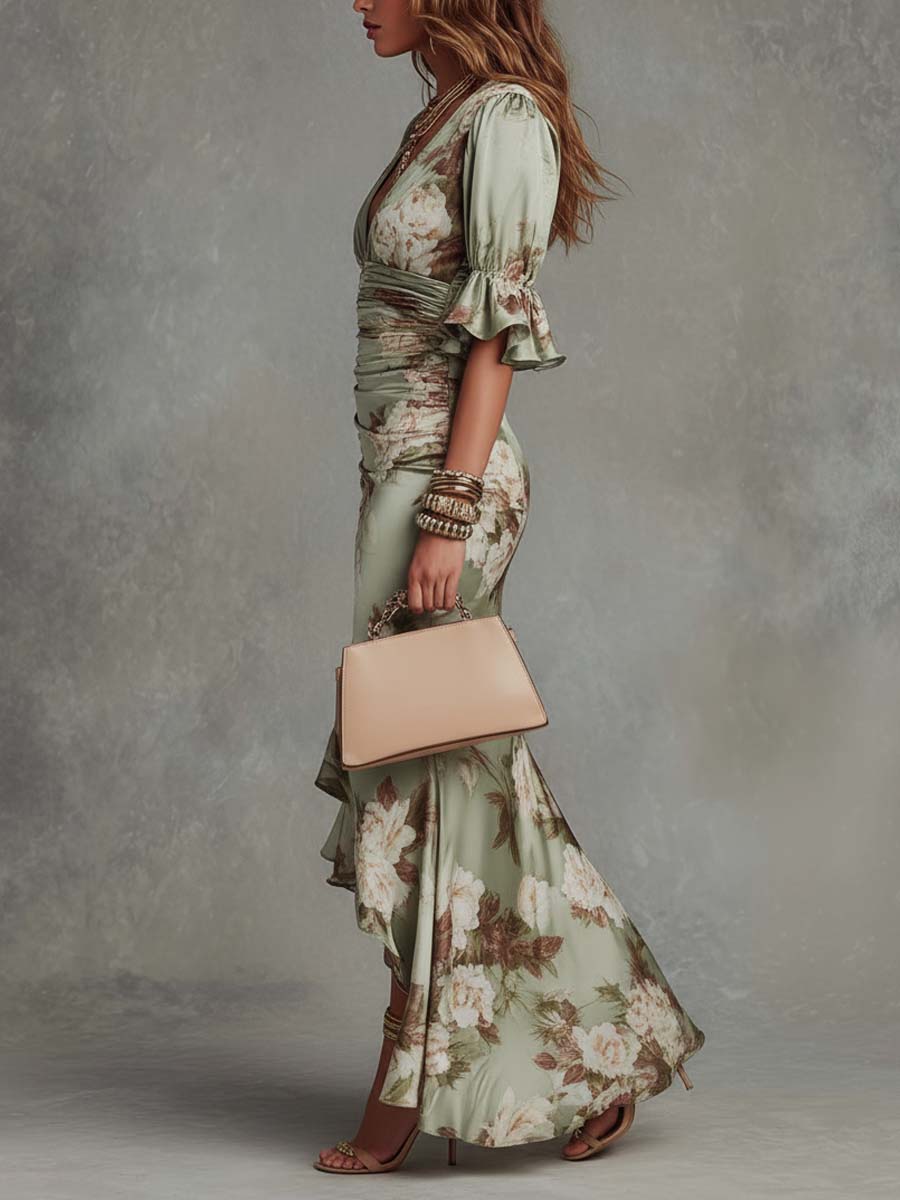 Elegant floral fishtail maxi dress, perfect as a wedding guest or evening party dress. V-neck, ruched.