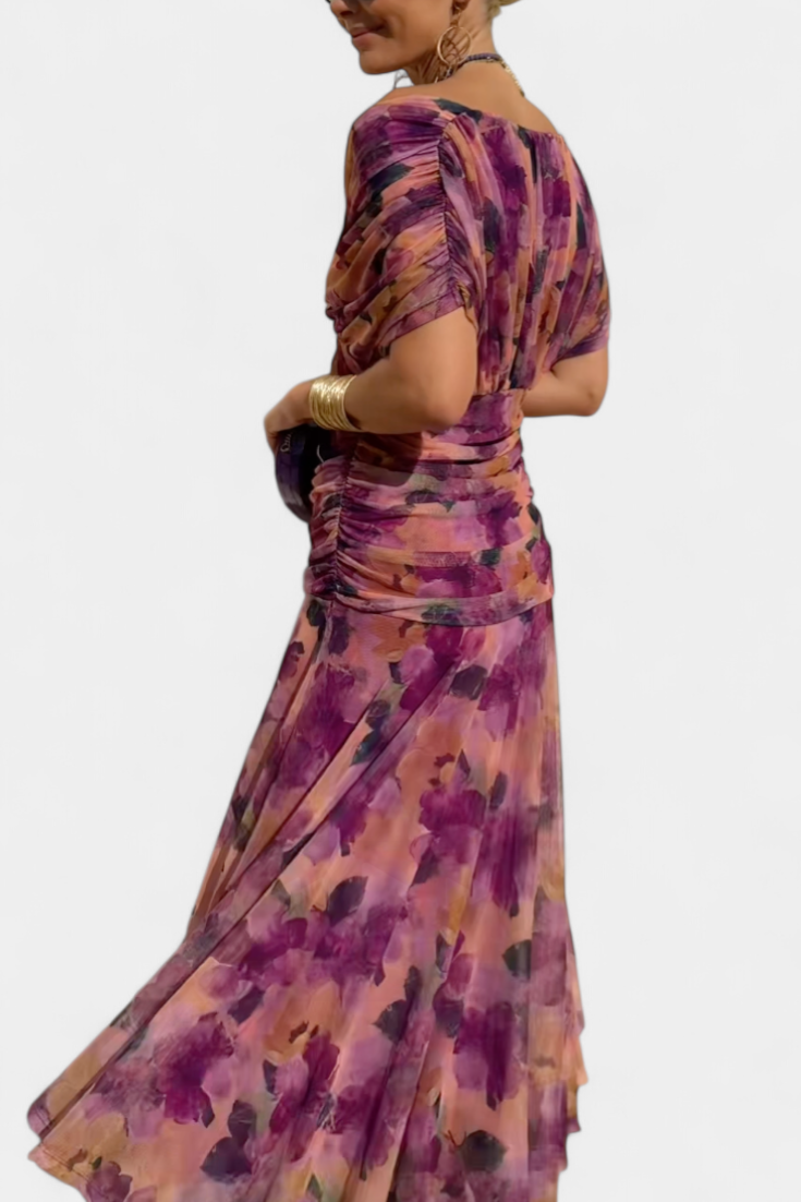 Women's floral off-shoulder maxi dress, elegant ruched sweetheart neckline, vibrant colors.