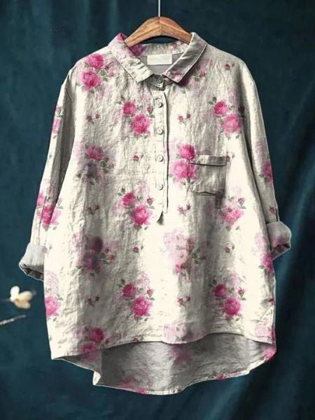 Women's collared floral button-up blouse. Relaxed fit, perfect for spring fashion.