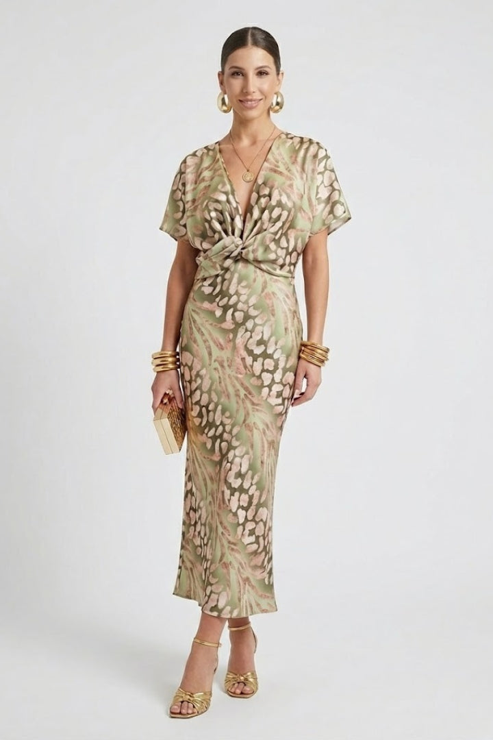 Elegant women's floral midi dress featuring a pleated skirt, ideal for summer parties and special occasion wear.