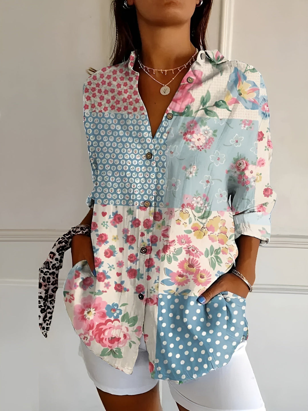 Stylish oversized floral print button-down shirt for women, ideal for relaxed summer fashion and comfort.