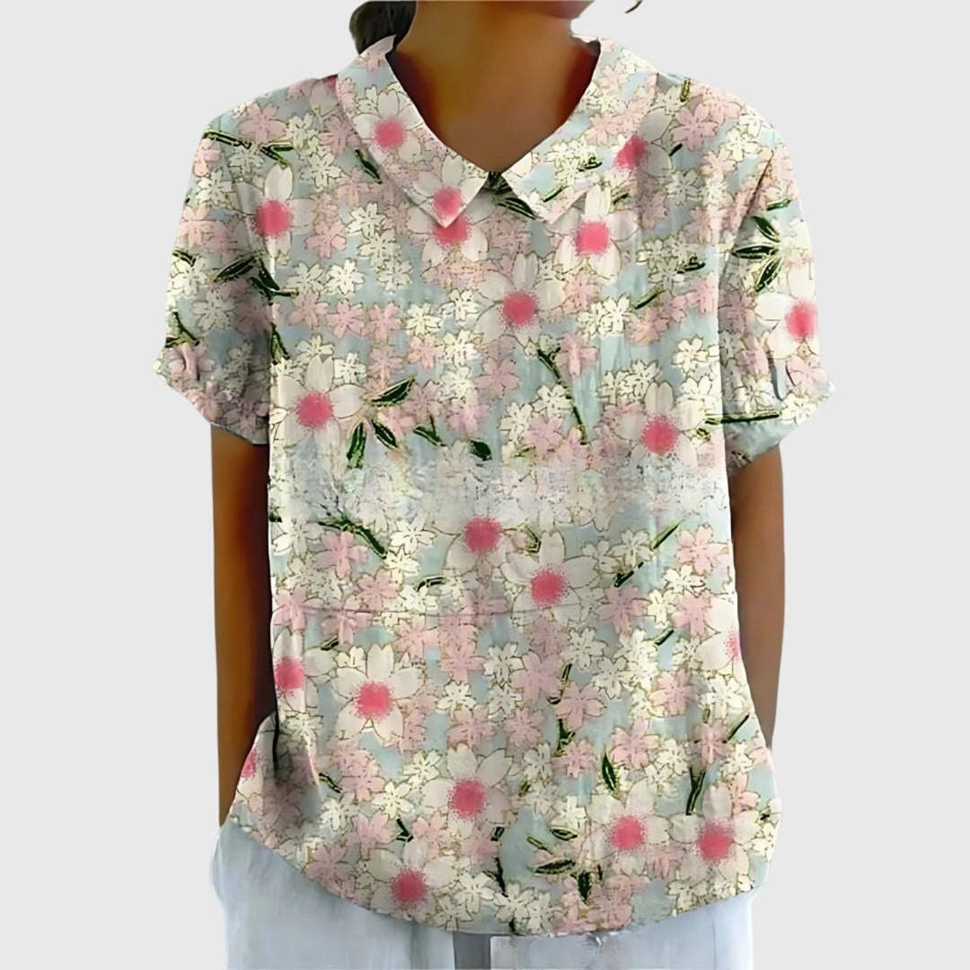Elegant women's floral print short sleeve blouse with a classic Peter Pan collar, ideal for summer casual wear.