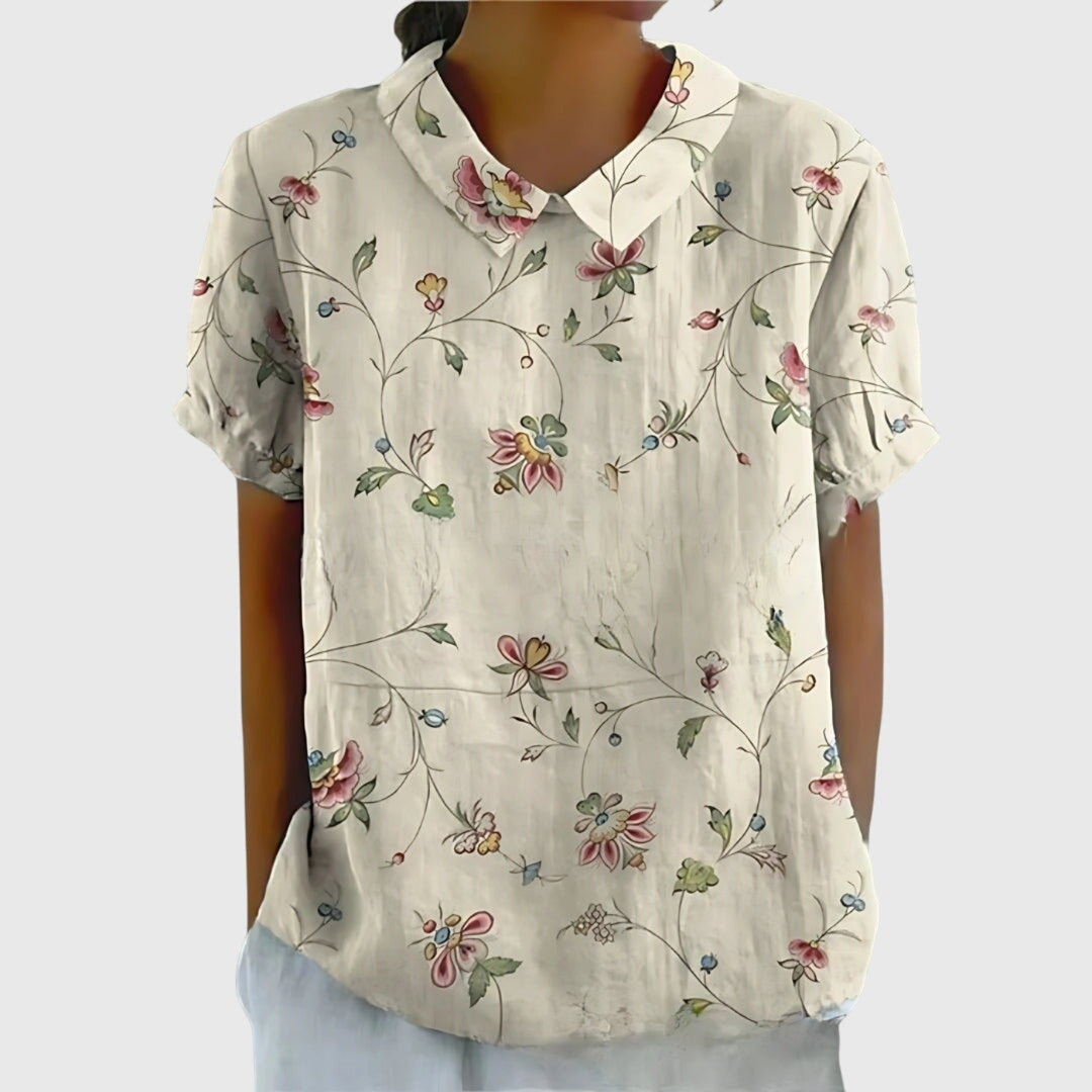 Versatile women's floral short sleeve blouse, perfect for everyday style or casual summer outfits, with a charming collar.