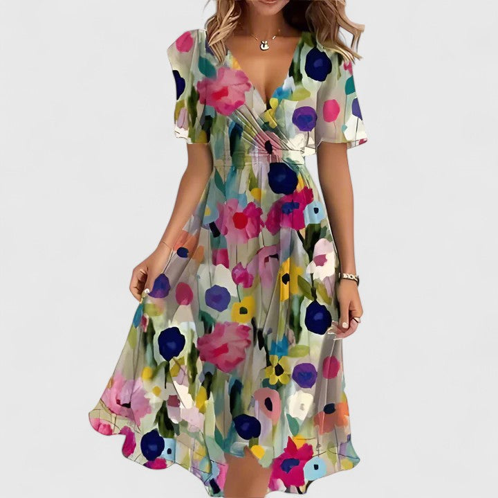 Party-ready women's floral midi dress with a V-neck, flutter sleeves, and flattering design.