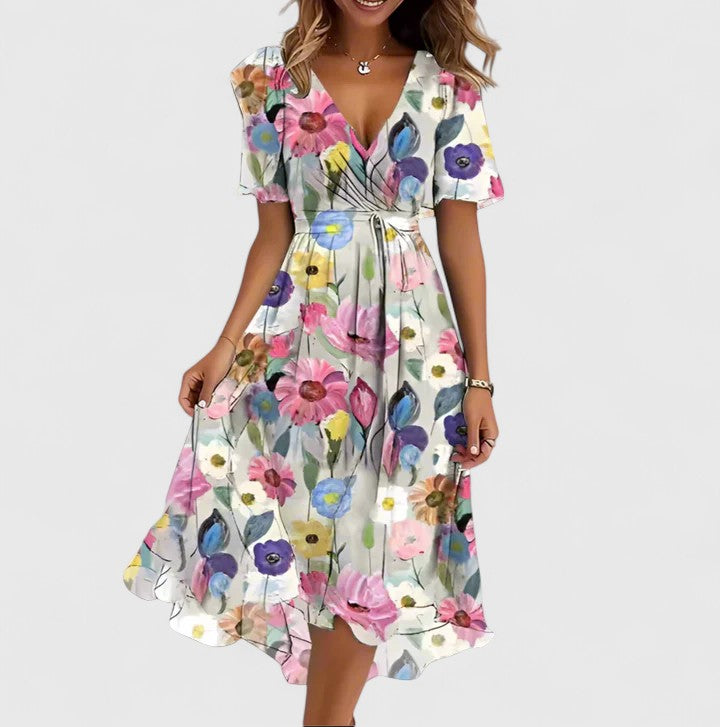 Vibrant floral V-neck midi dress for women, designed with elegant flutter sleeves for spring.