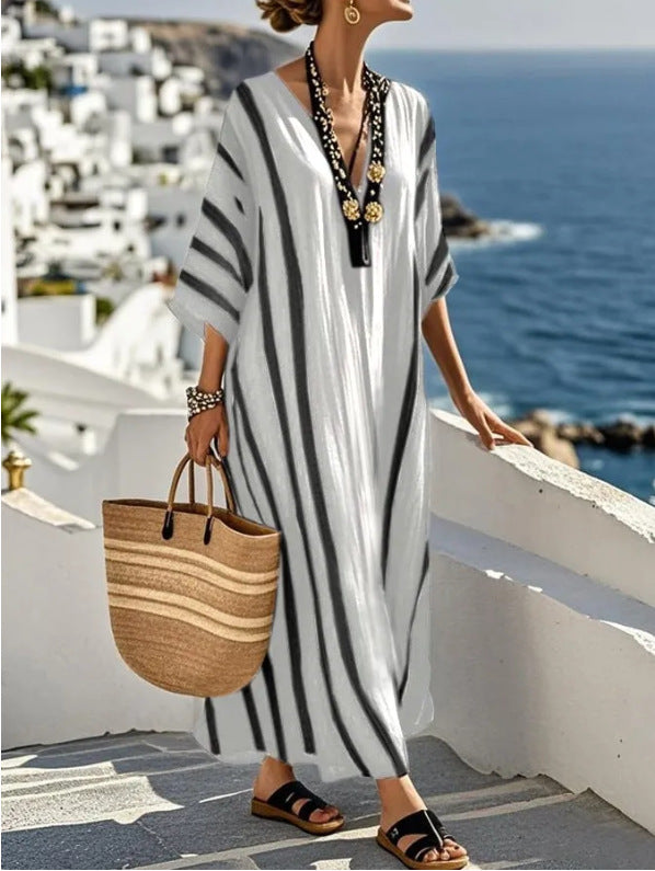 Comfortable women's long kaftan dress. Elegant flowy maxi, ideal for summer beach trips, resort wear & casual style.