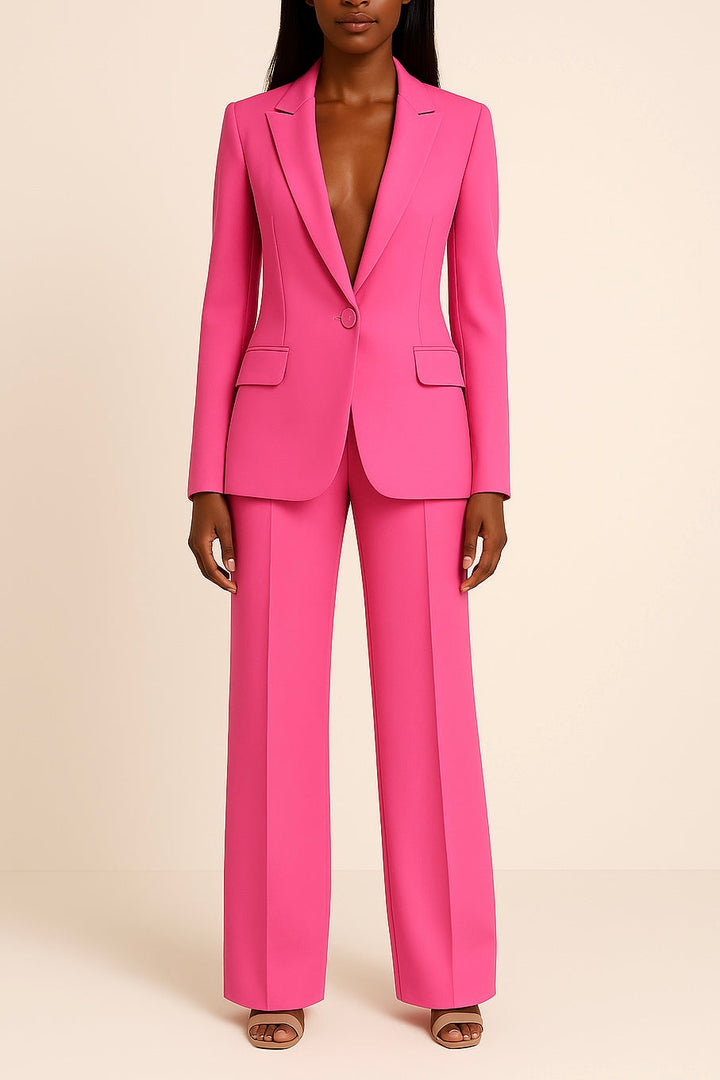 Chic women's two-piece suit with a long blazer & matching trousers. Sophisticated formal wear for modern professionals.