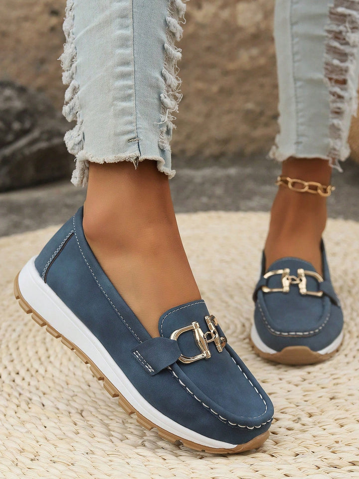 Gray women's comfort loafers with a gold buckle, excellent for everyday style and easy slip-on wear.
