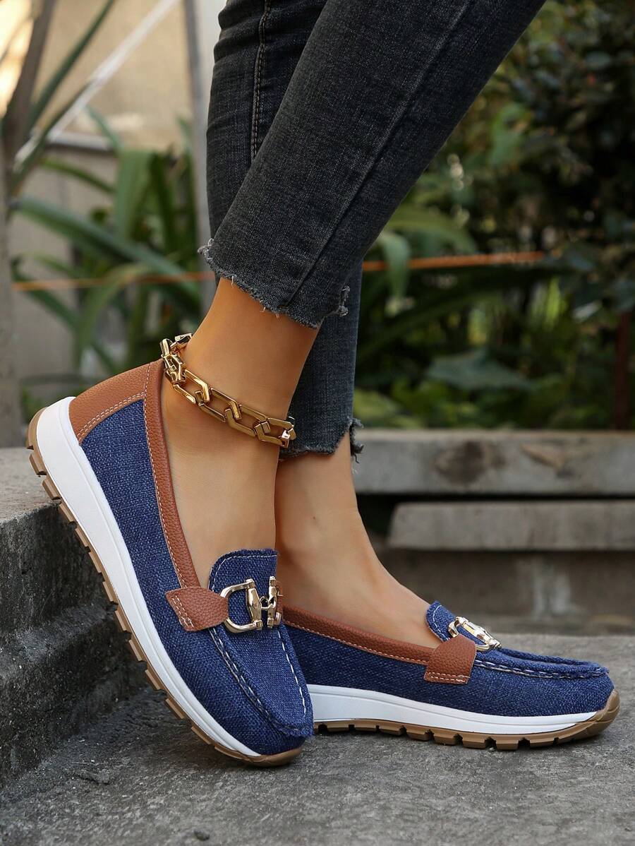 Elegant women's gold-trim horsebit loafers, designed for all-day comfort and professional style.