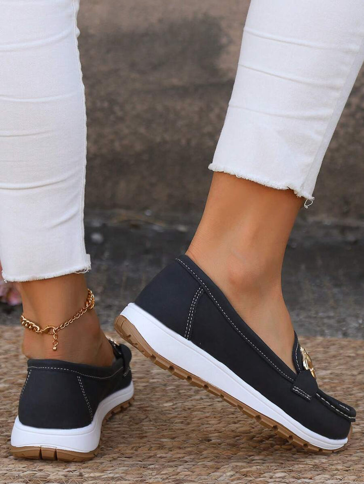 Grey women's gold-trim horsebit loafers, comfortable and stylish casual flats.