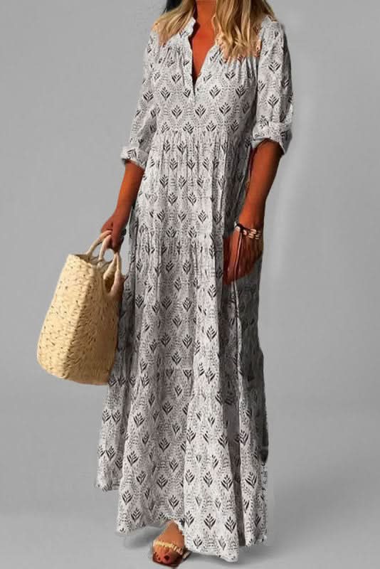 Stylish Women's Tiered Maxi Dress with flowing design, perfect for summer or occasion wear.