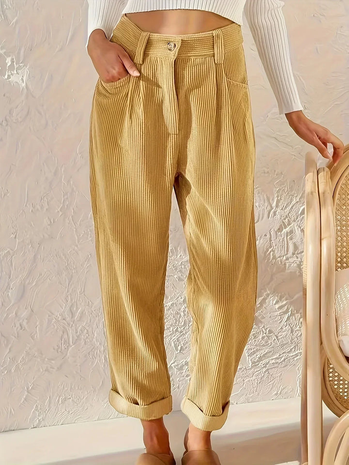 Women's high-waisted corduroy trousers with a straight leg, perfect for classic everyday or office wear.