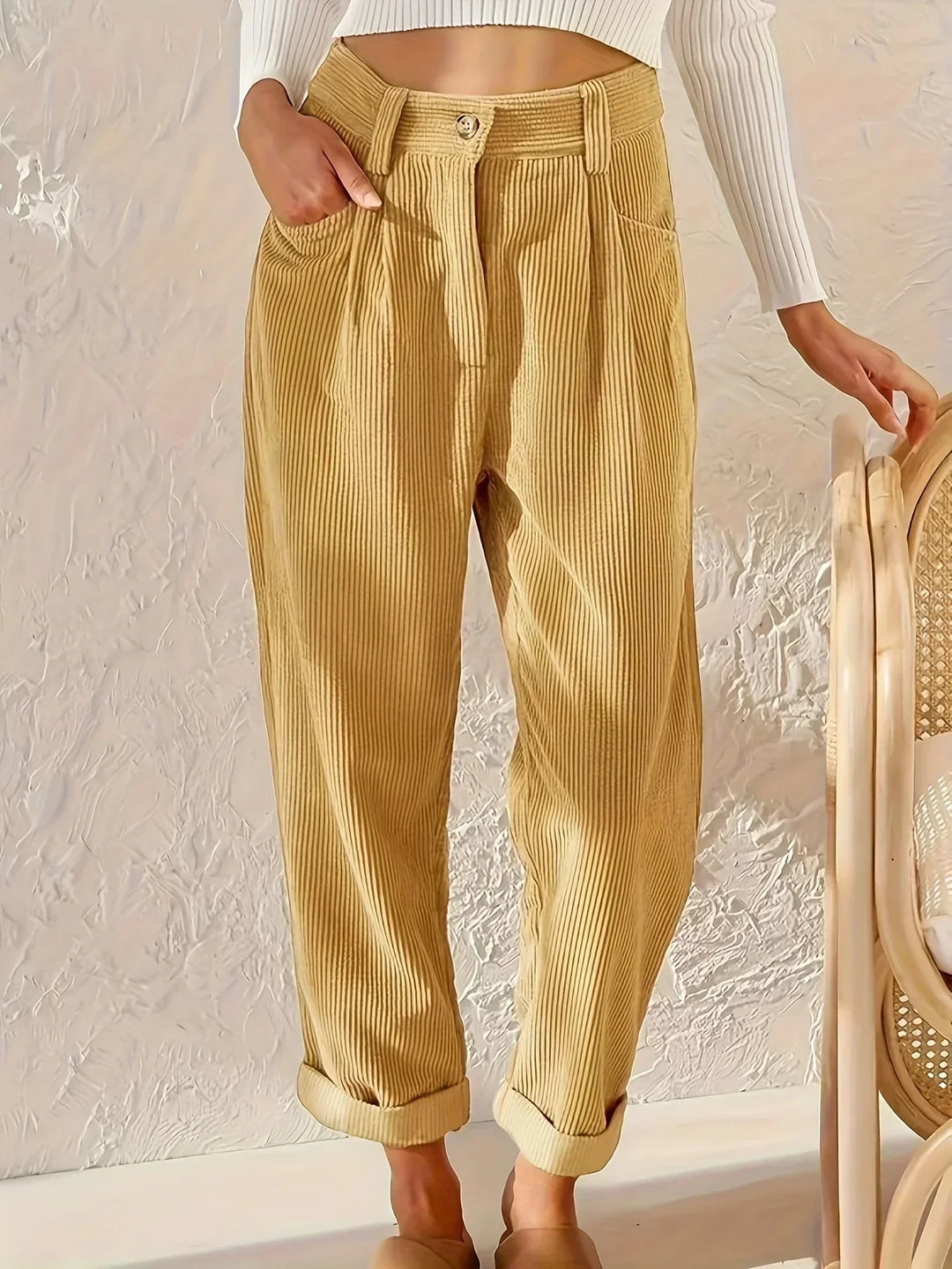 Stylish women's high-waisted straight-fit corduroy pants, a comfortable classic for any wardrobe.