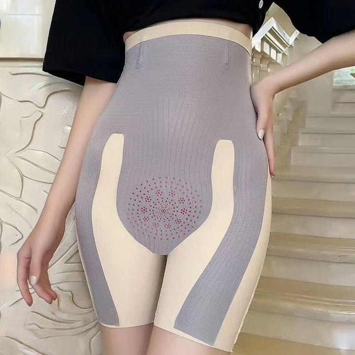 Woman confidently wearing high-waisted tummy control shaper pants for a streamlined look