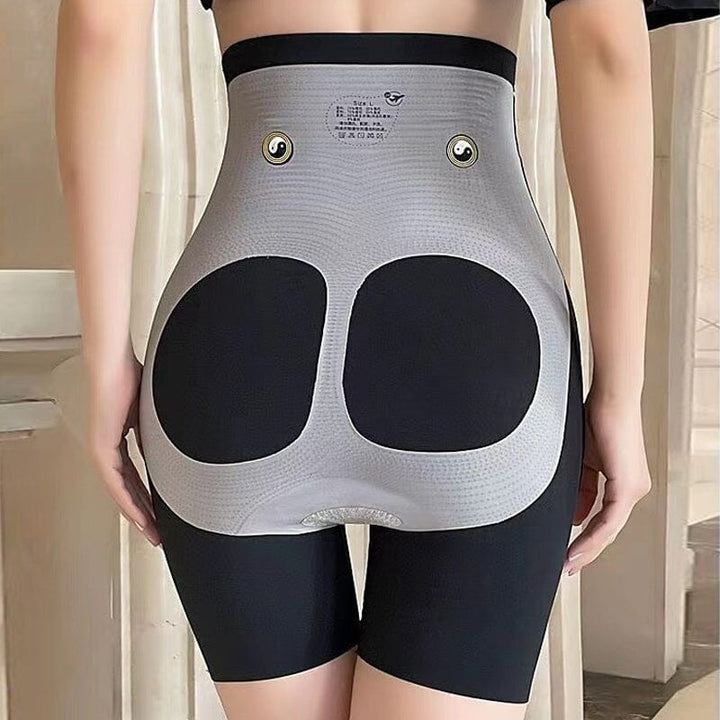 Flat lay of black high-waisted tummy control shaper pants, highlighting stretch and design