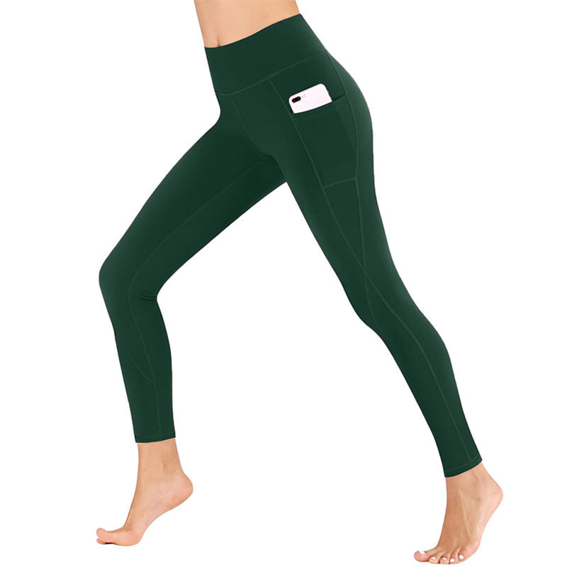 Dynamic shot of women's yoga leggings with pockets, perfect for intense workouts & mindful practice.