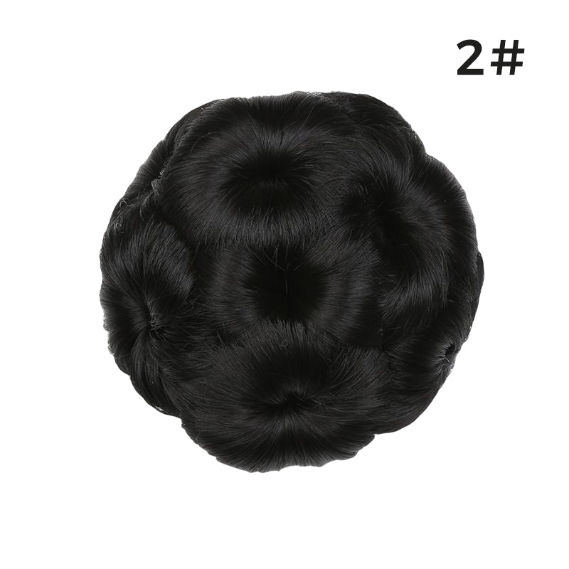 Close-up of the flower detail on the synthetic bun hair clip extension updo