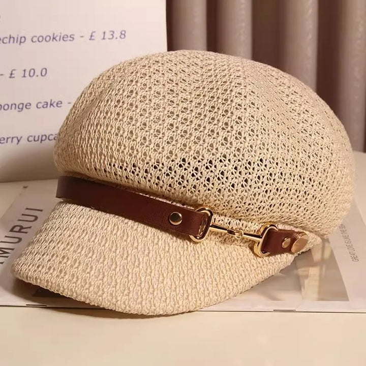 Back view of a women's knitted sun hat showing breathable weave, perfect for summer accessory