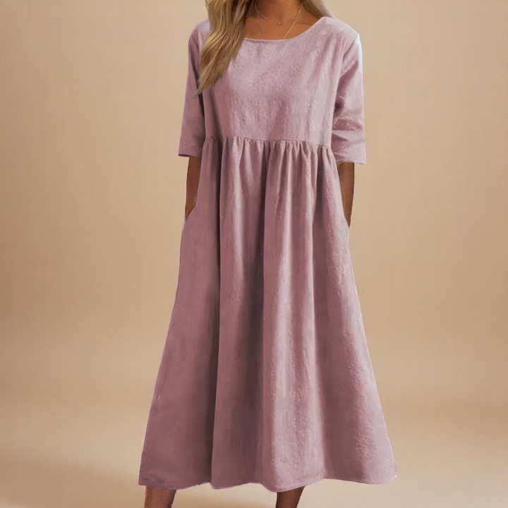 Comfortable & lightweight women's flowy summer dress with pockets, great for casual, everyday, & travel.