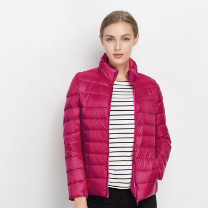 Wind-resistant women's packable puffer outerwear, an essential lightweight jacket for travel and cold weather.