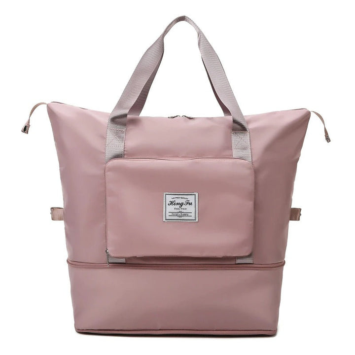 Waterproof weekender travel bag for women, lightweight & expandable. Protects essentials from rain, ideal carry-on.