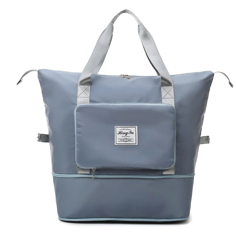 Women's lightweight duffel bag, waterproof, expandable with multiple compartments. Perfect weekender carry-on.