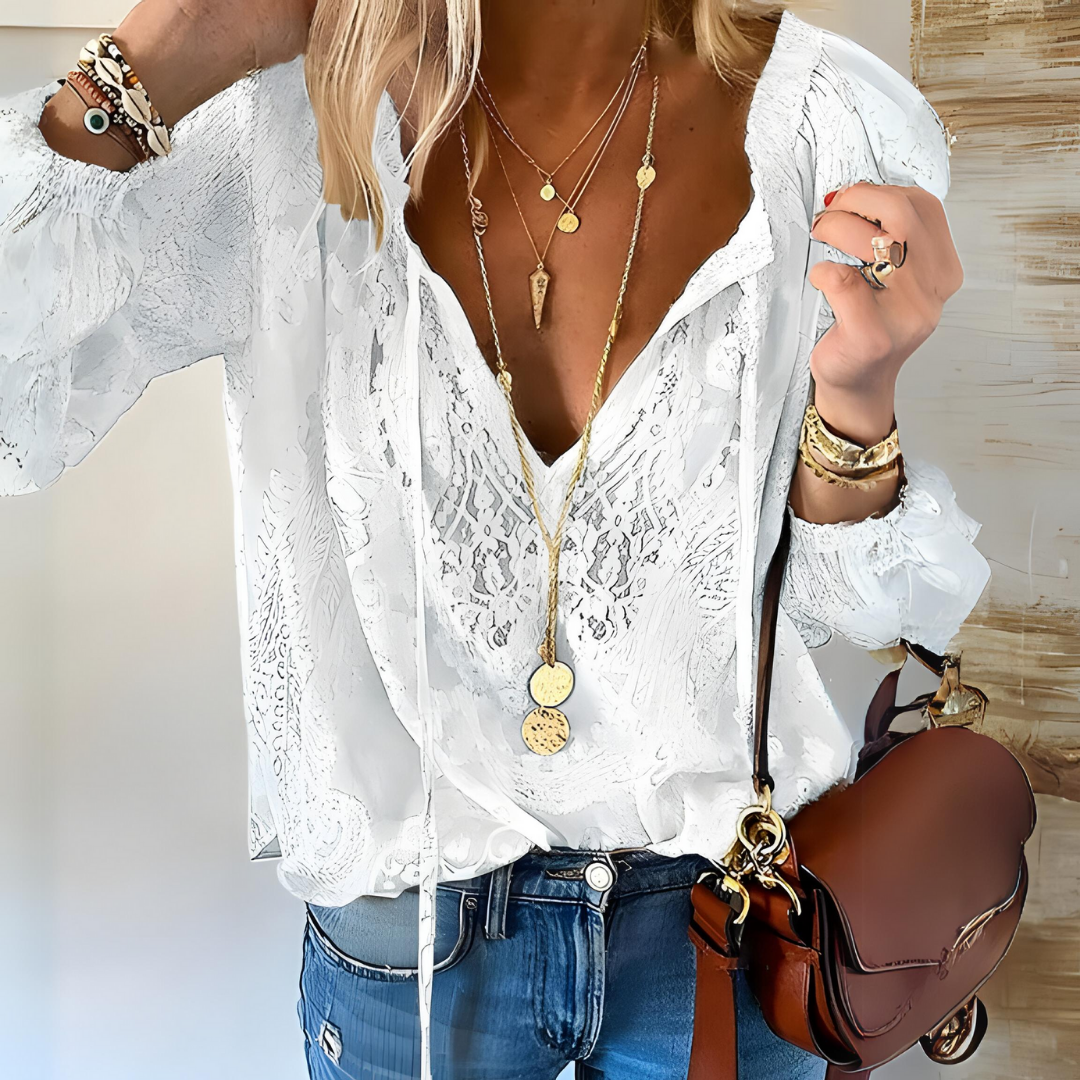 Fashionable women's bohemian blouse featuring artisan design, a chic loose-fit top for casual wear.