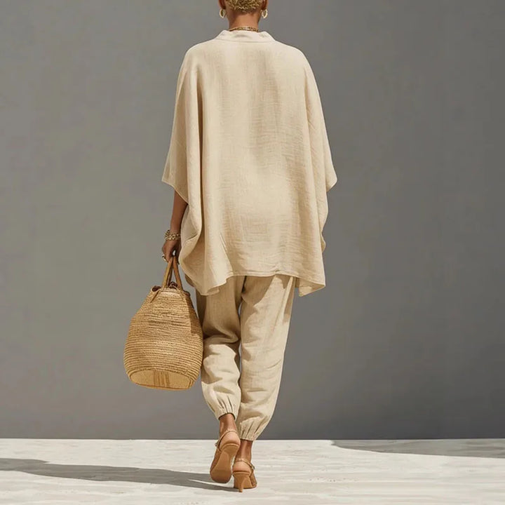Apricot linen blend two-piece set for women, featuring a relaxed batwing top & comfortable tapered pants.