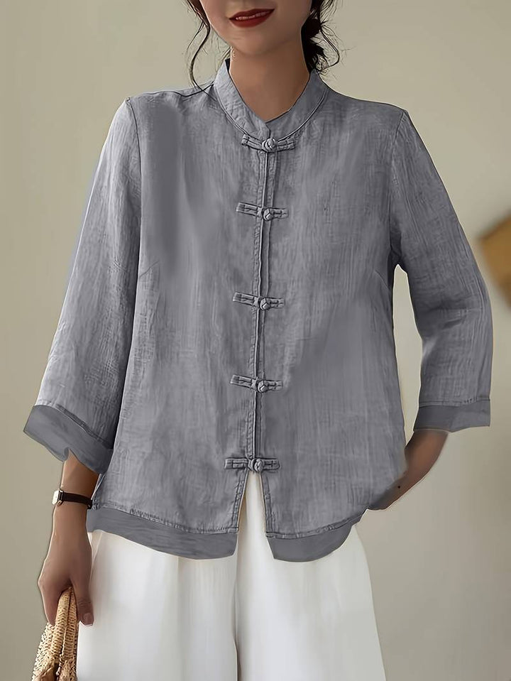 Versatile women's office wear blouse, mandarin collar, elegant frog buttons, chic summer top.