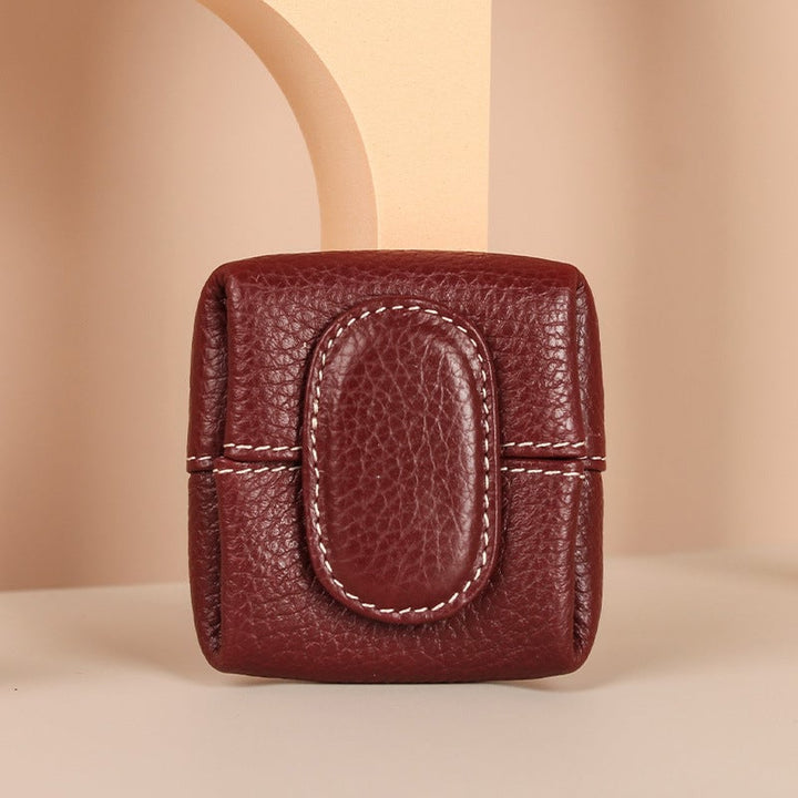 Mini leather coin purse in a bold fuchsia, a fun and practical small bag