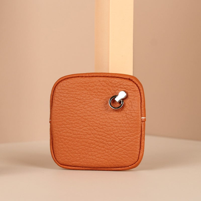 Vibrant blue mini leather accessory, perfect for coins and small items, durable and stylish