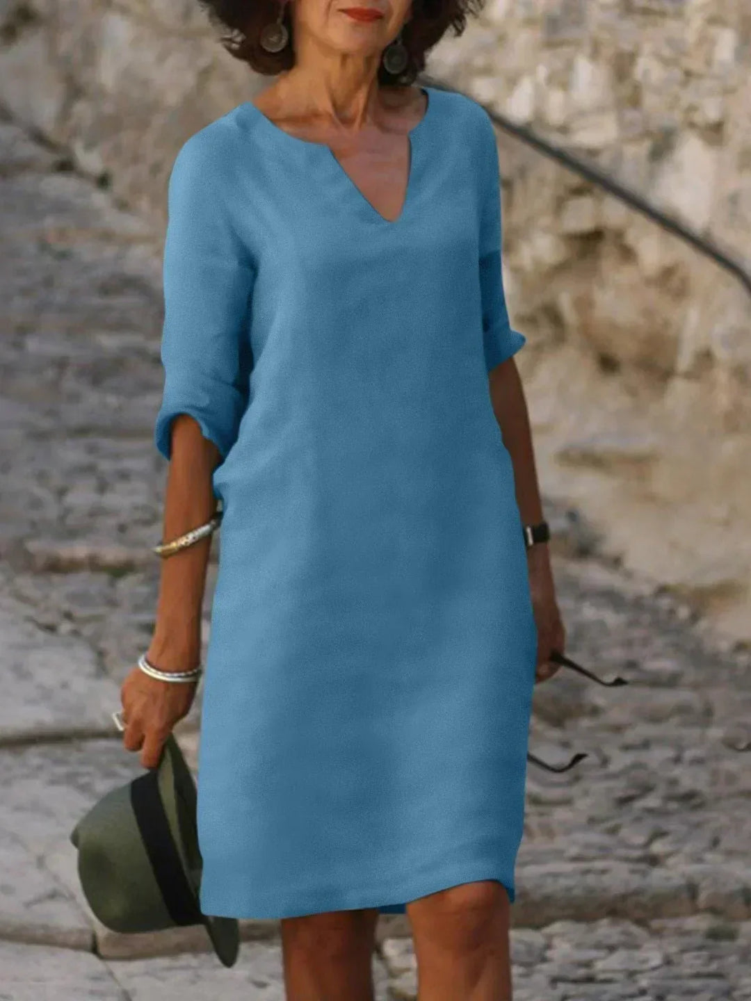 Everyday women's mini dress, V-neck, 3/4 sleeves, and loose fit for ultimate comfort and style.
