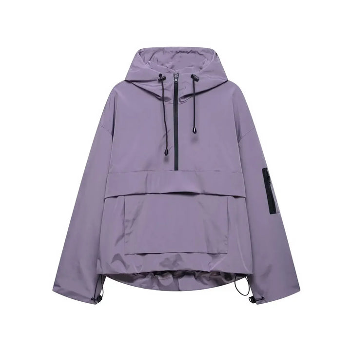 Minimalist women's winter coat with hood, black, durable fabric for skiing and cold weather protection.