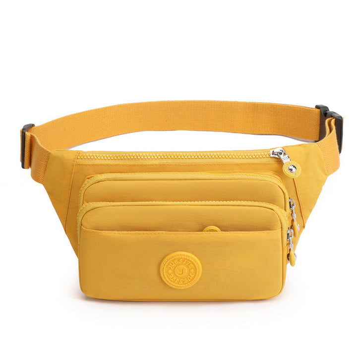 Lightweight black nylon crossbody bag, a compact multi-pocket solution for women