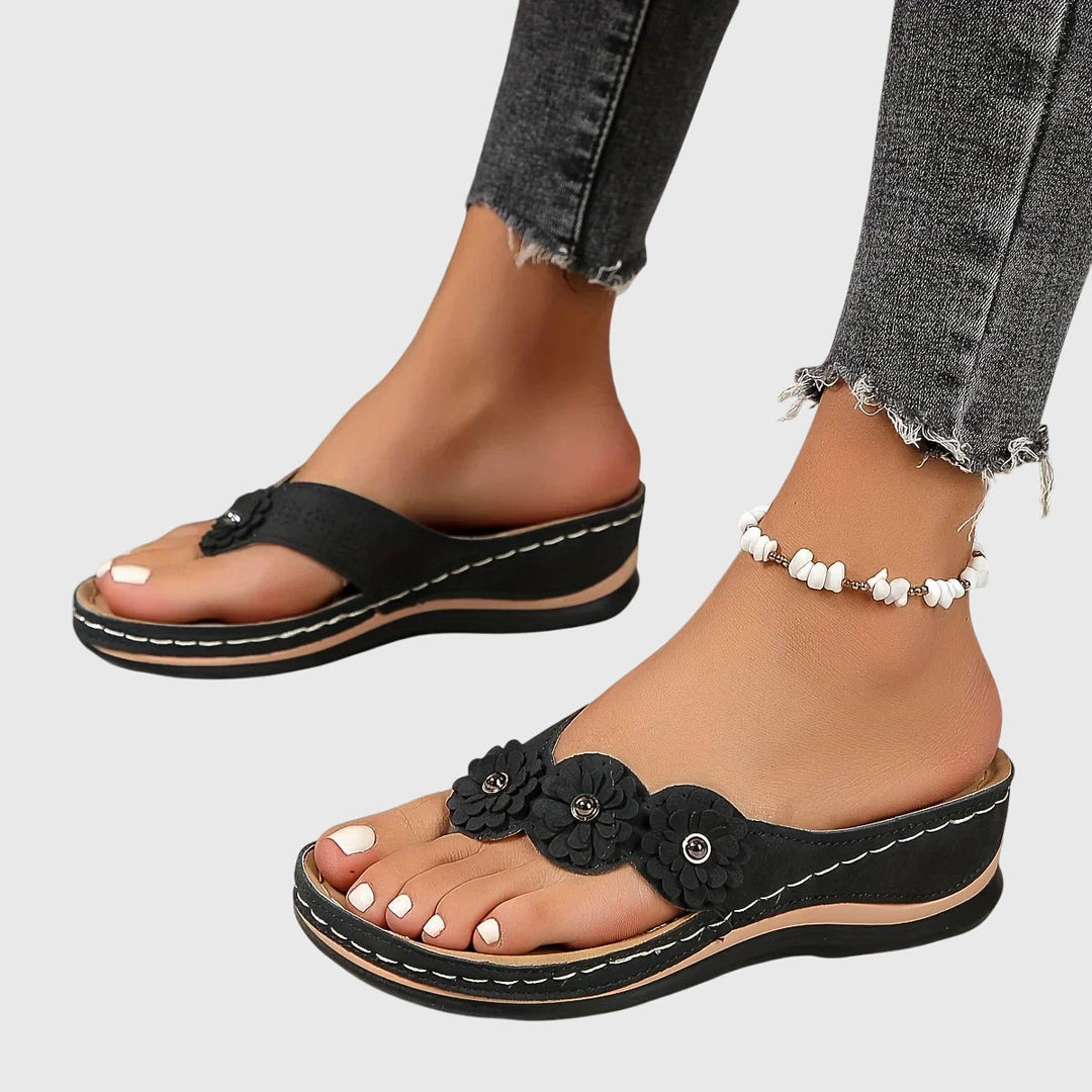 Ergonomic women's flip flops offering superior arch support and shock absorption for everyday comfort.