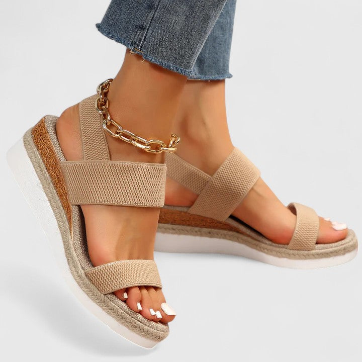 Comfortable women's open-toe wedge sandals for plantar fasciitis & heel pain relief. Orthopedic arch support.