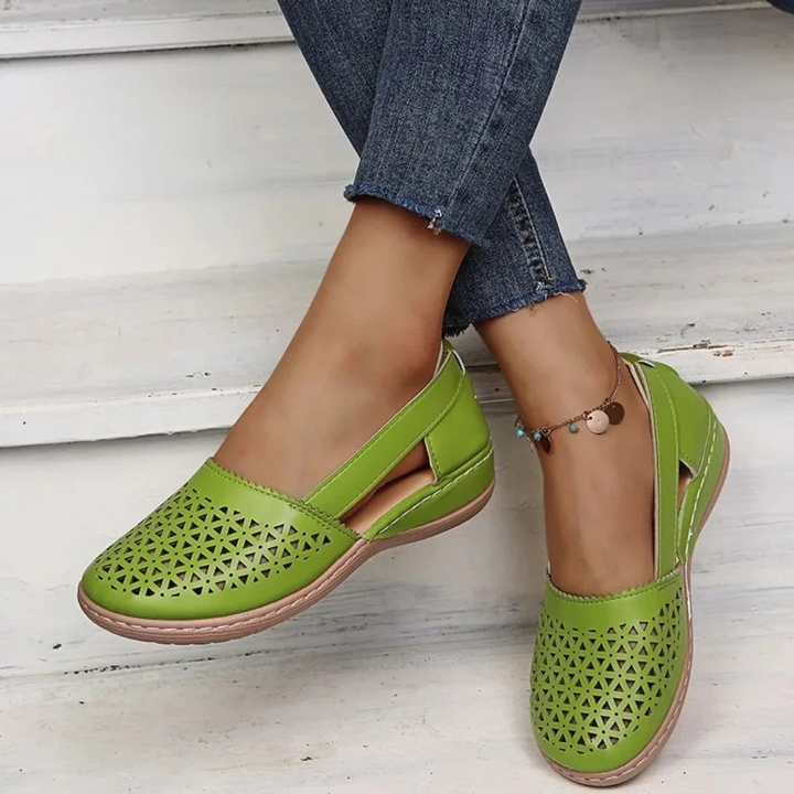 Women's orthopedic slip-on wedge flats, providing superior arch support & all-day comfort.