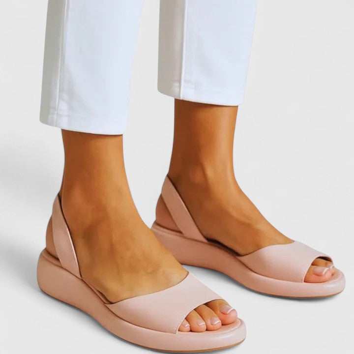 Cushioned orthopedic women's sandals, slip-on style, offering foot pain relief & comfort.