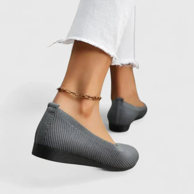 Lightweight women's orthopedic slip-on shoes providing superior arch support & all-day comfort.