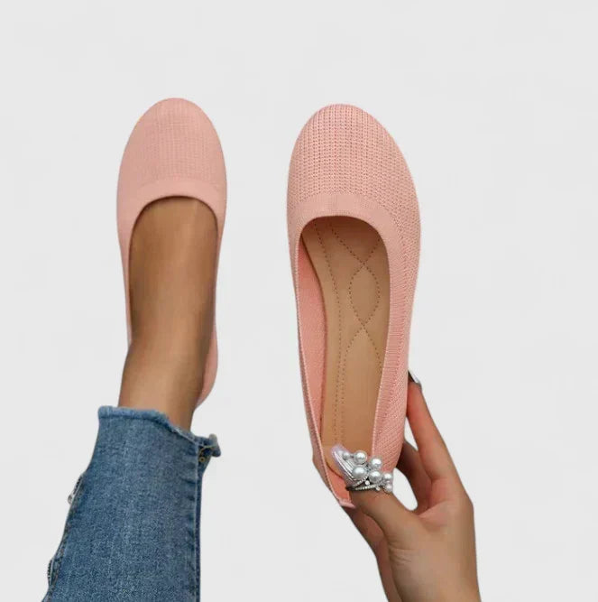 Supportive women's walking slip-on shoes with orthopedic arch support for active comfort.