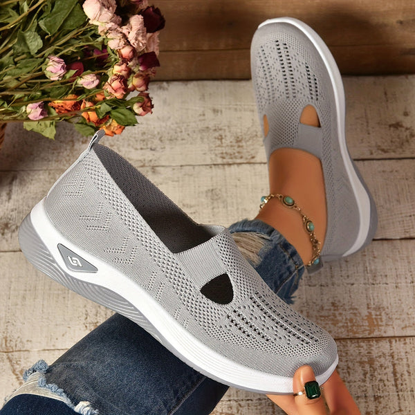Women's perforated low-cut orthopedic slip-on sneakers, ideal for casual walking & athletic comfort.