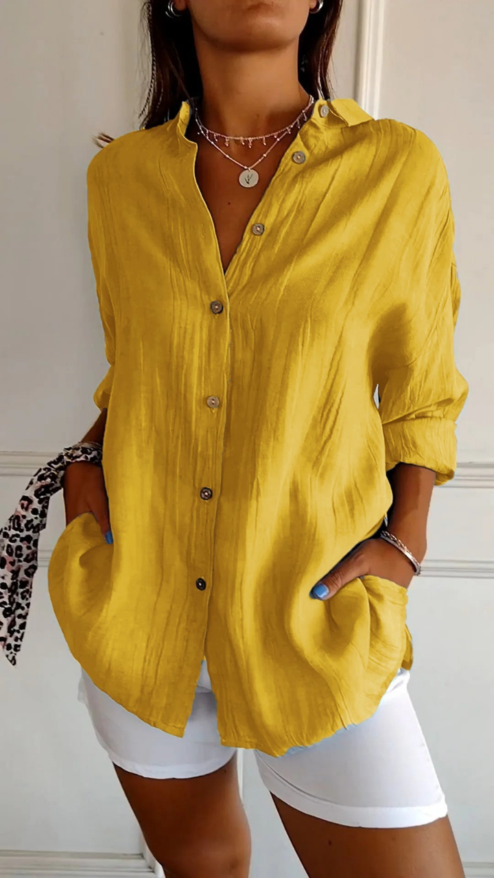 Casual women's long-sleeve button-down shirt, oversized fit, an essential for versatile styling.
